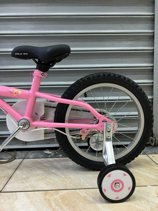 Size 16 Cruz Trek bicycle: aluminum or steel frame, 16-inch wheels.