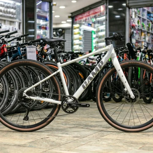 CAMP 700C Gravel Hybrid Bike with 9-Speed SHIMANO CUES Drivetrain